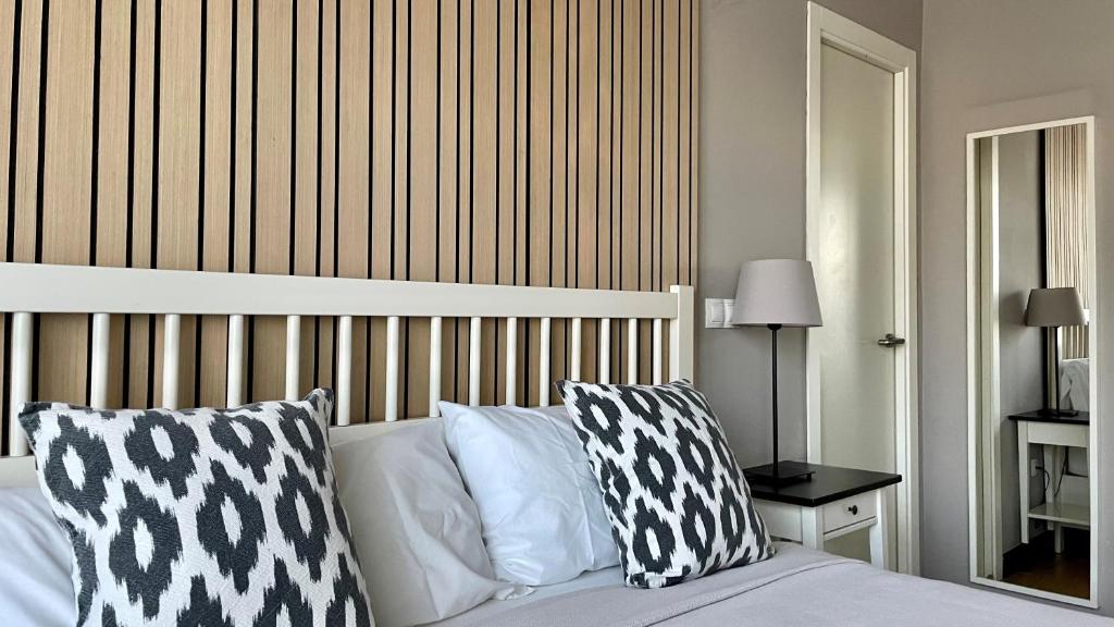 Posteľ alebo postele v izbe v ubytovaní MD Modern Hotel - Jardines