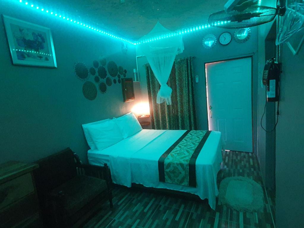 Postel nebo postele na pokoji v ubytování Mesmerize Guest House