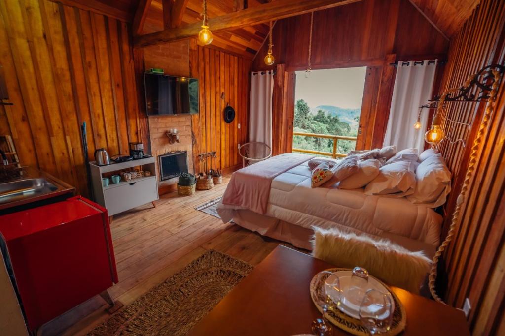 TV a/nebo společenská místnost v ubytování Montanha Home