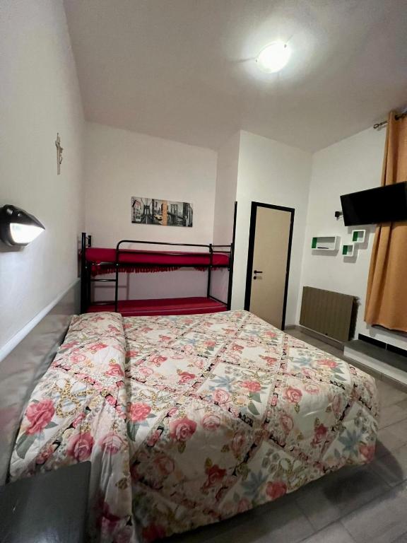 Postel nebo postele na pokoji v ubytování Hotel Centrale