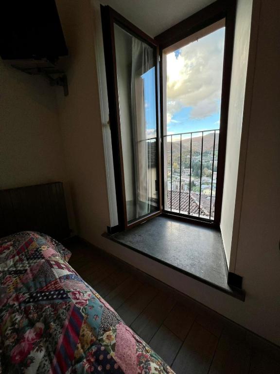 Postel nebo postele na pokoji v ubytování Hotel Centrale