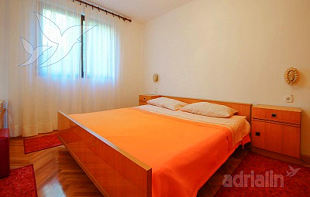 Postel nebo postele na pokoji v ubytování SIMPER
