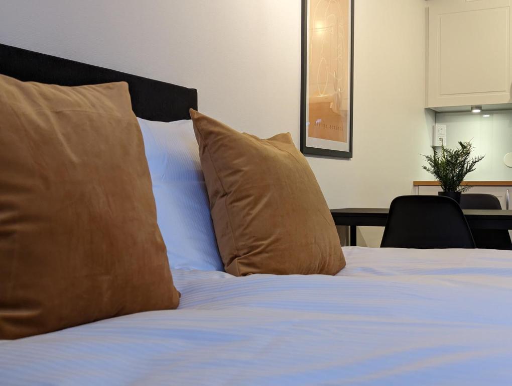 Posteľ alebo postele v izbe v ubytovaní Hotell Bro
