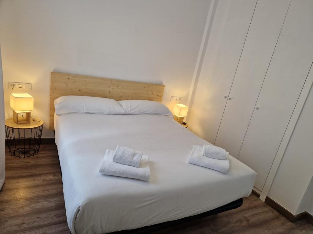 Postel nebo postele na pokoji v ubytování Eth Palai