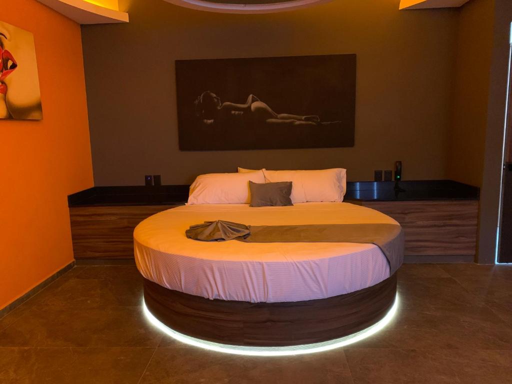 Postel nebo postele na pokoji v ubytování Roxy Motel