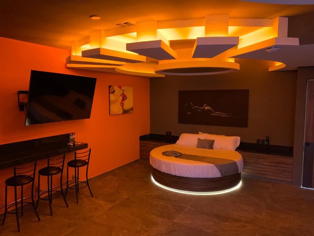 TV a/nebo společenská místnost v ubytování Roxy Motel