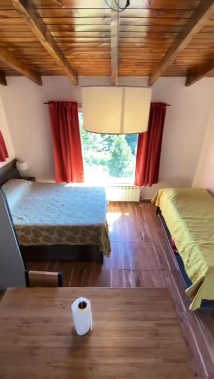 Postel nebo postele na pokoji v ubytování Astrolabio Hostel