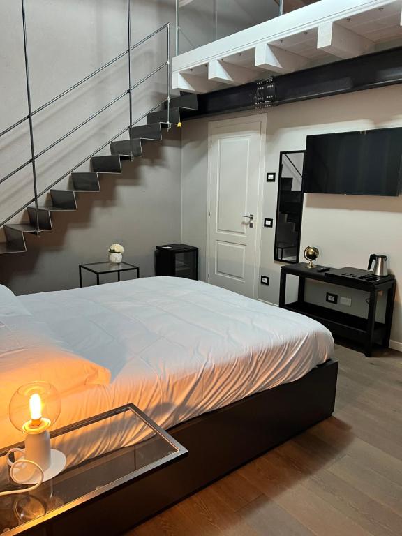 Postel nebo postele na pokoji v ubytování V&B Suites and Apartments