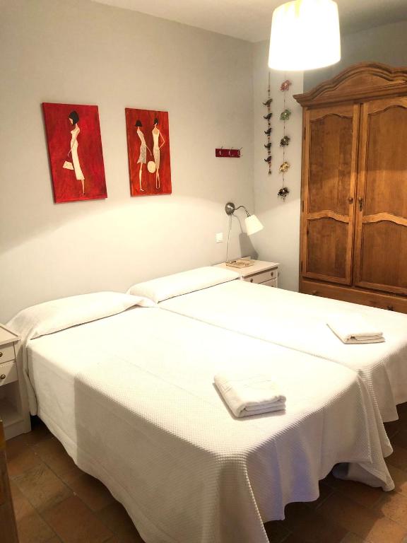A bed or beds in a room at Nueva Cazorla Mirador Cerro del Escribano