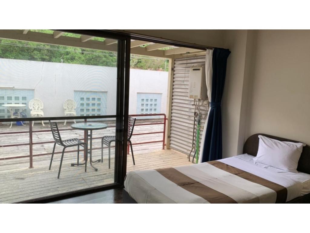 Giường trong phòng chung tại On the Beach Lue - Vacation STAY 91546v