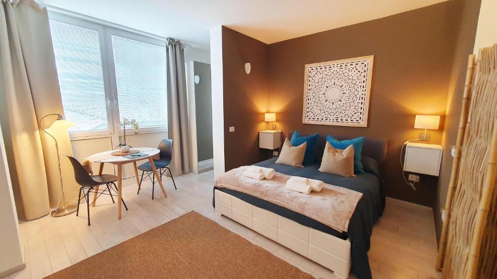 Postel nebo postele na pokoji v ubytování Apartment Giotto Eremitani
