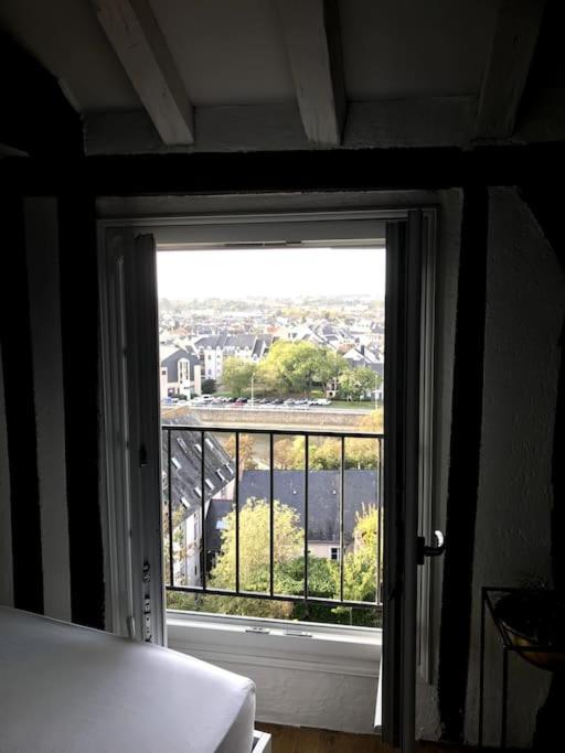 Posteľ alebo postele v izbe v ubytovaní Appartement dans le Vieux Mans
