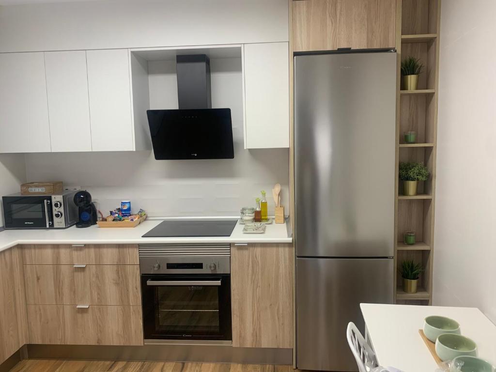 A kitchen or kitchenette at Rincón Santa Eulalia. Parking y Desayuno incluido.