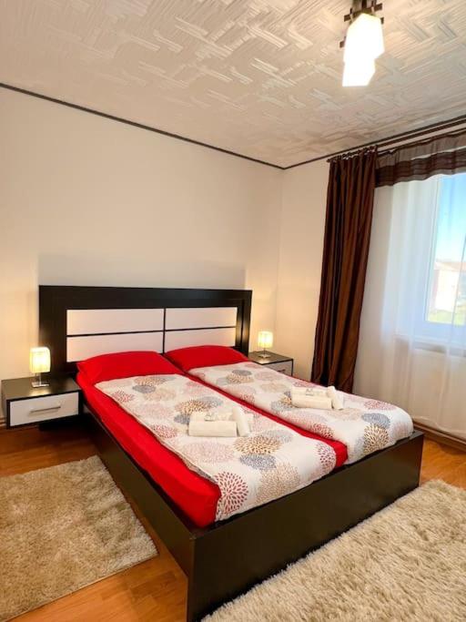 A bed or beds in a room at [NEW] Apartment 15 minutes from the ski slopes