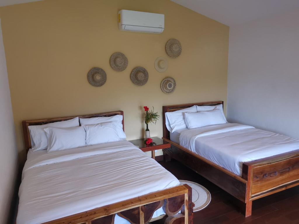 Postel nebo postele na pokoji v ubytování Gatun Lake Lodge Hotel
