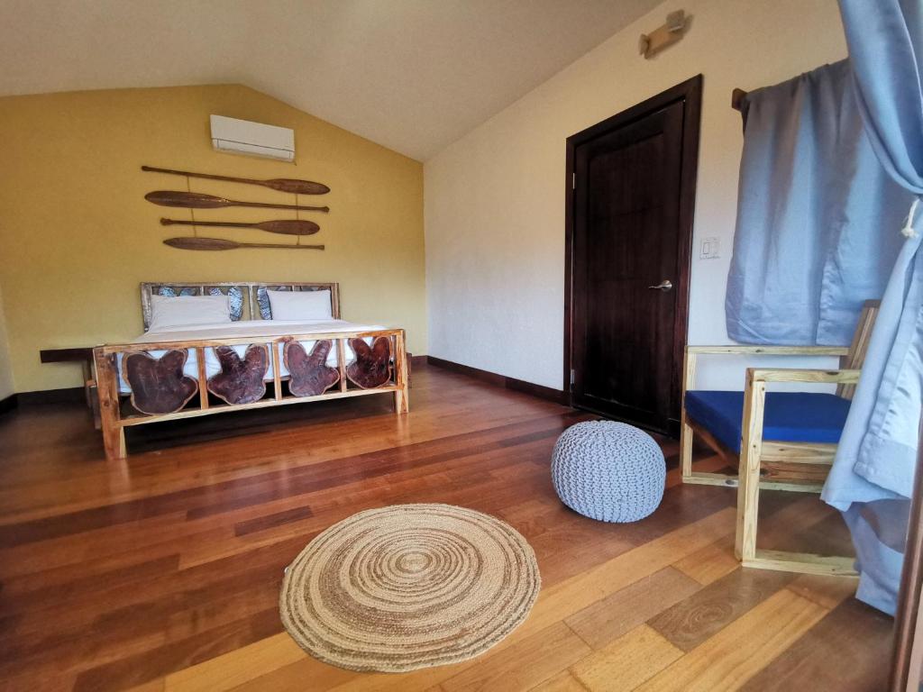 Postel nebo postele na pokoji v ubytování Gatun Lake Lodge Hotel