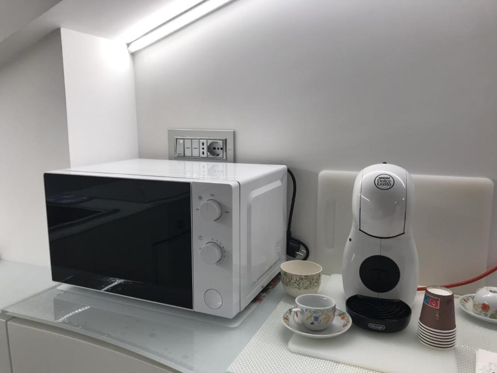 A kitchen or kitchenette at Maria Ancona suite