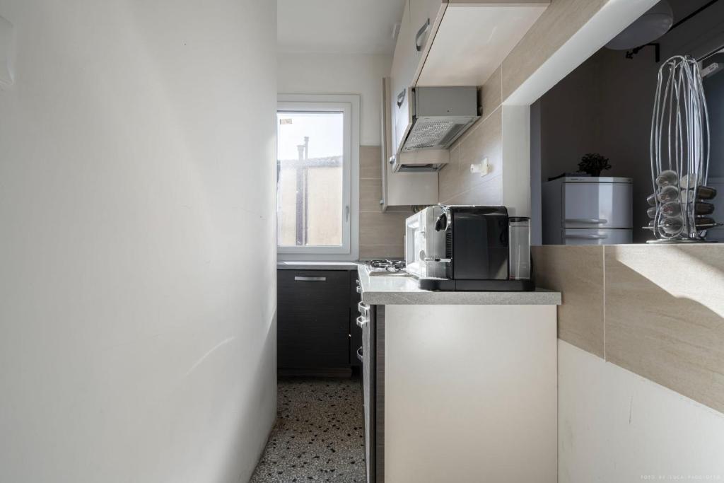 Kuchyňa alebo kuchynka v ubytovaní Ca' Giorgia Venice Apartment with Balcony