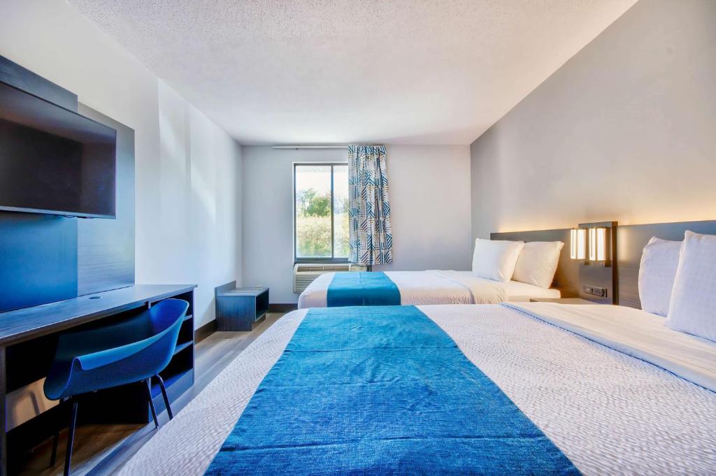Postel nebo postele na pokoji v ubytování Motel 6 Jeffersonville, IN