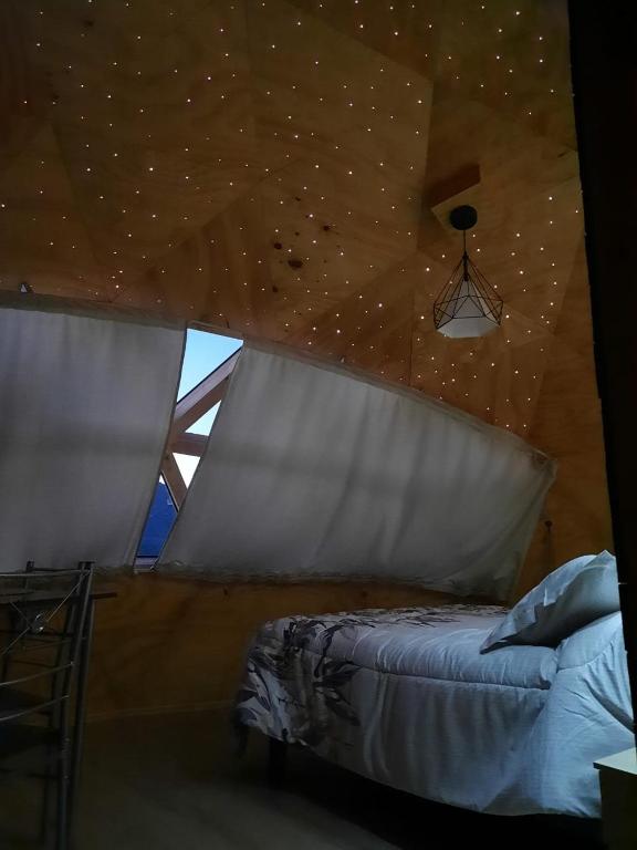 Postel nebo postele na pokoji v ubytování Domos Trayenko