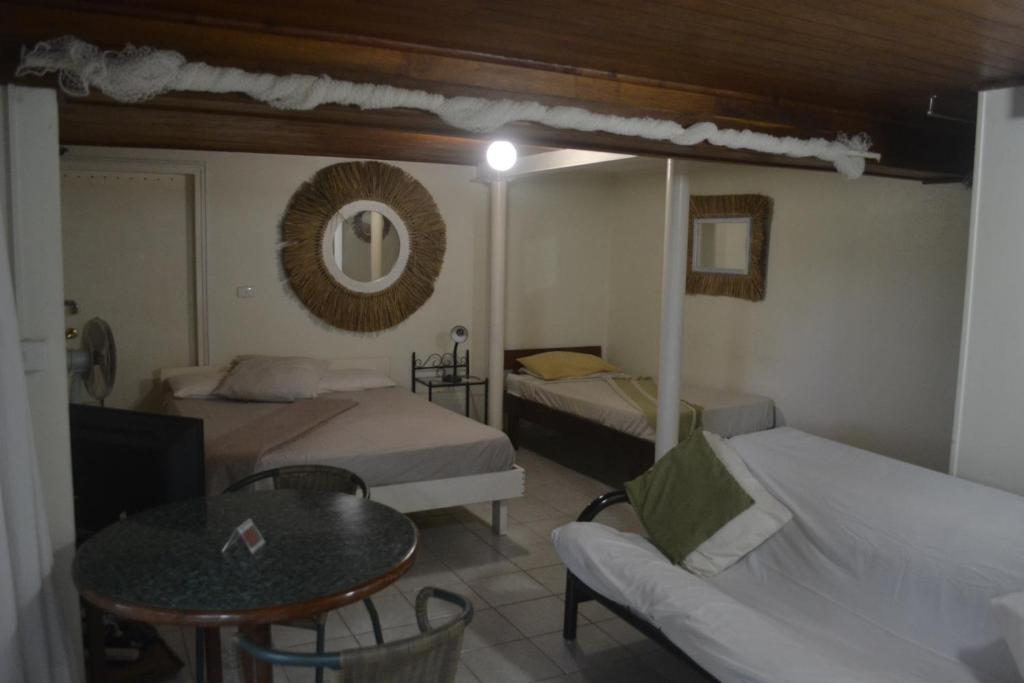 Postel nebo postele na pokoji v ubytování Seachange Lodge