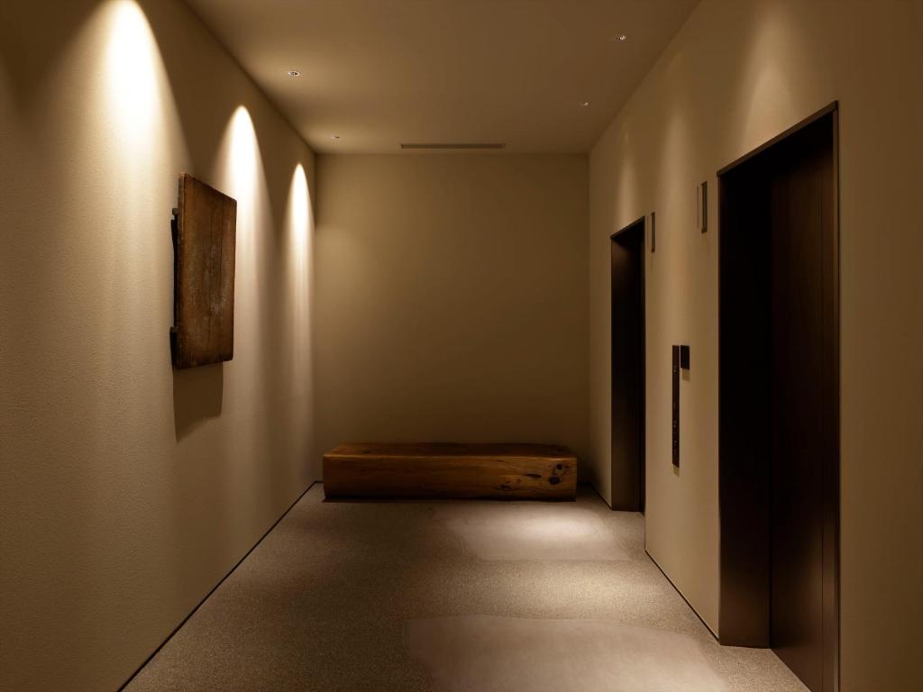 Postel nebo postele na pokoji v ubytování SOKI Kanazawa