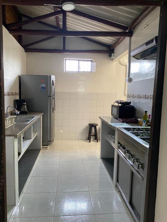 Kuchyň nebo kuchyňský kout v ubytování Destino Nómada Calle 11 n 1-38