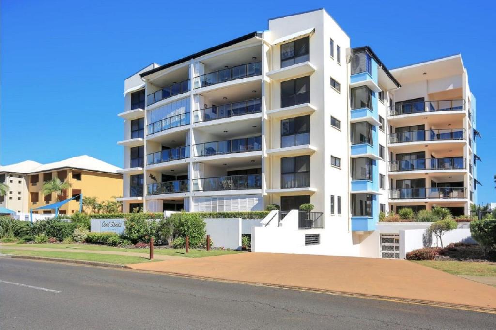 an apartment building on the side of a street at 404b Coral Sands in Bargara