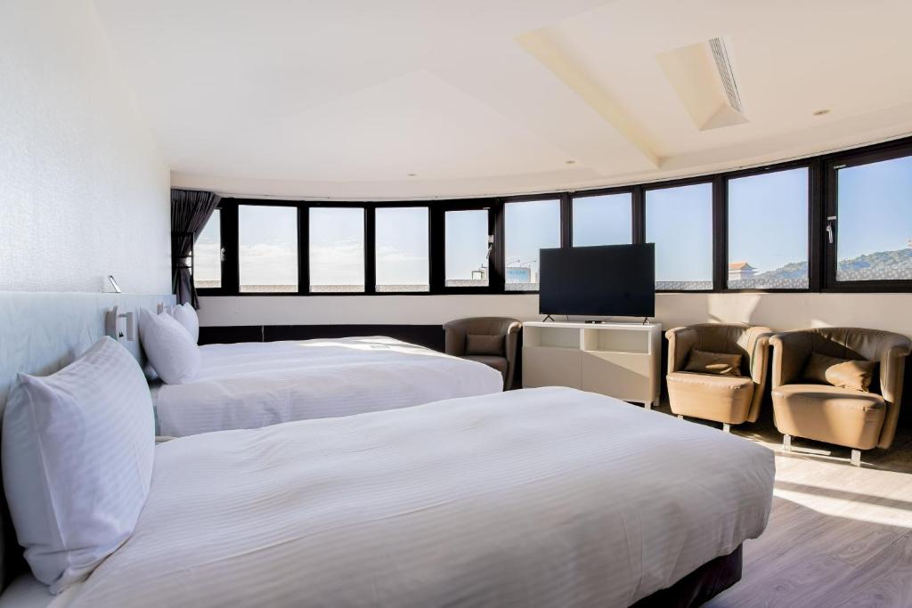 Voodi või voodid majutusasutuse Hub Hotel - Songshan Airport Branch toas