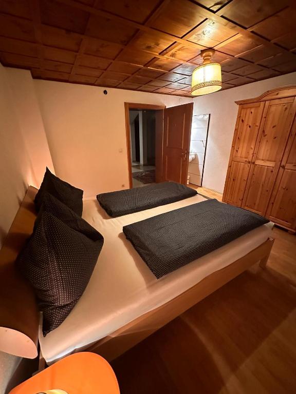 Postel nebo postele na pokoji v ubytování Haus St. Martin