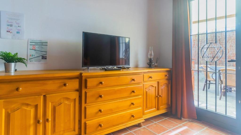 TV a/nebo společenská místnost v ubytování Villa El Recreo Cortes de la Frontera by Ruralidays