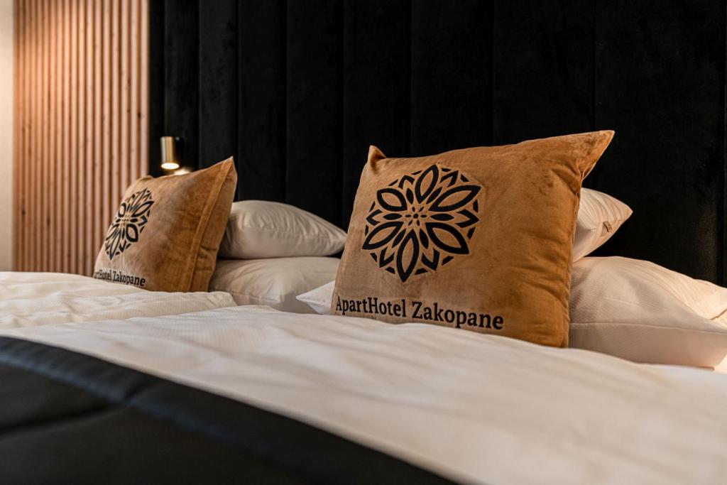 Posteľ alebo postele v izbe v ubytovaní Aparthotel Zakopane
