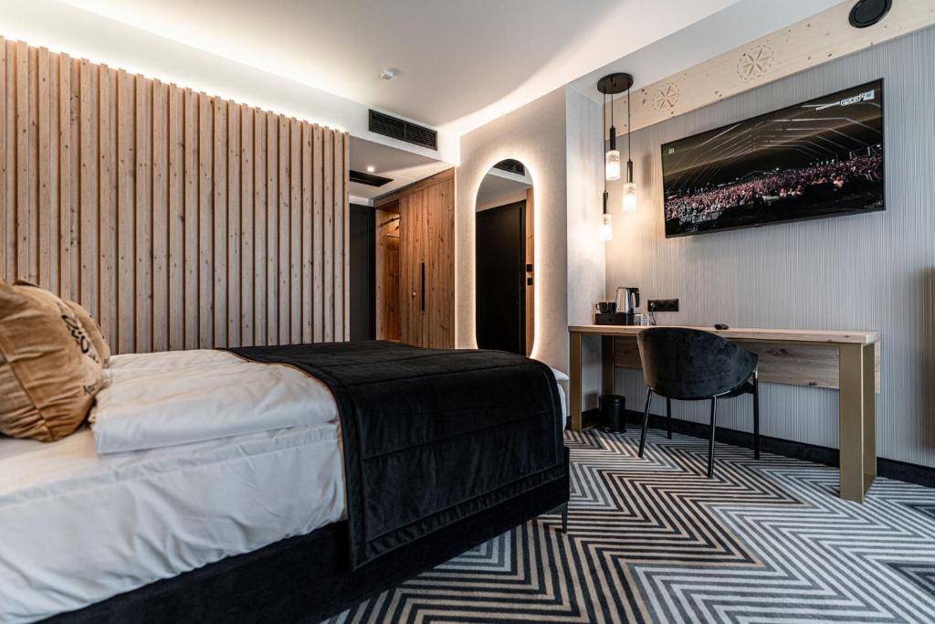Posteľ alebo postele v izbe v ubytovaní Aparthotel Zakopane