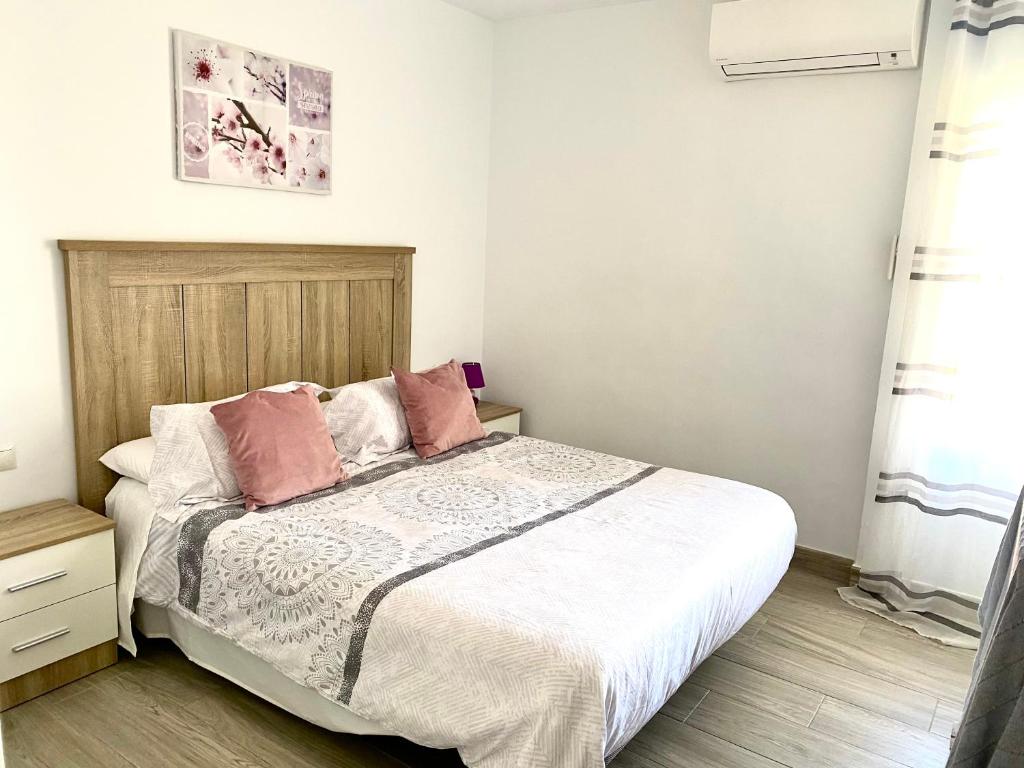 Postel nebo postele na pokoji v ubytování Iris Vistas Benalmadena