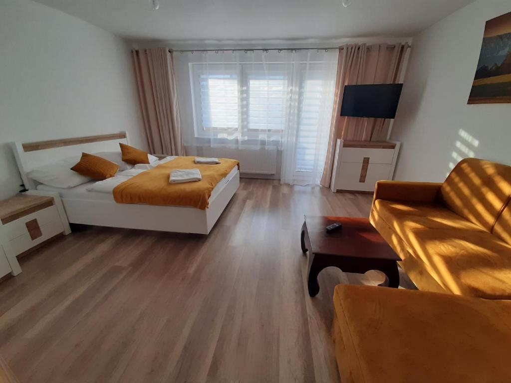 Postel nebo postele na pokoji v ubytování Willa Rosa-apartamenty z prywatną sauną