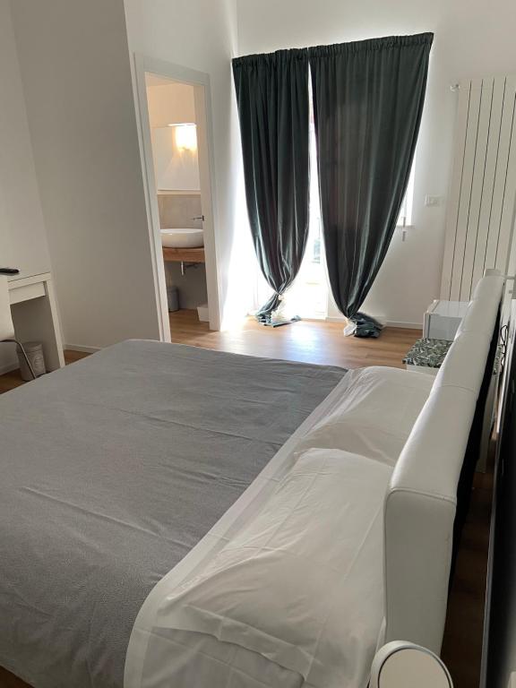 Postel nebo postele na pokoji v ubytování Civico 28