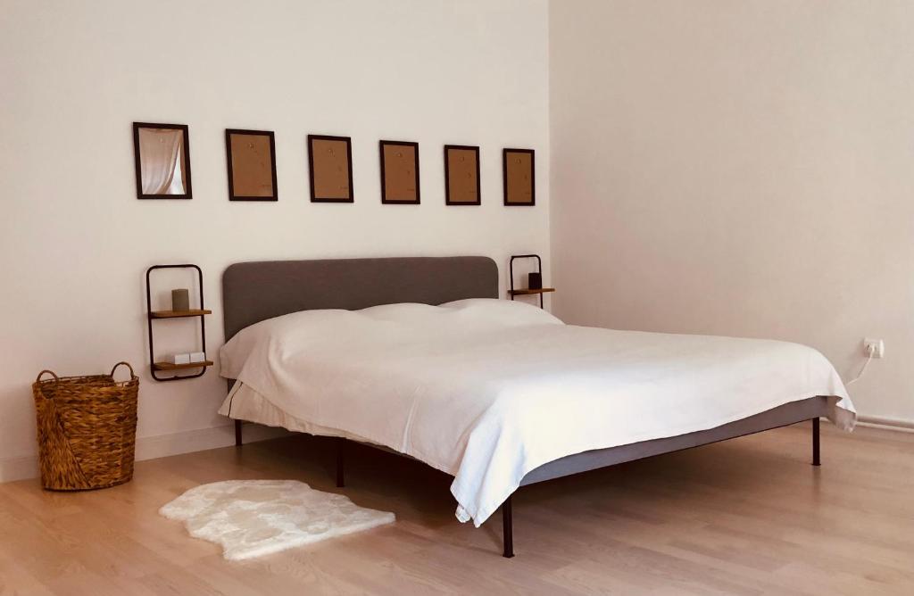 Posteľ alebo postele v izbe v ubytovaní ALMAFA