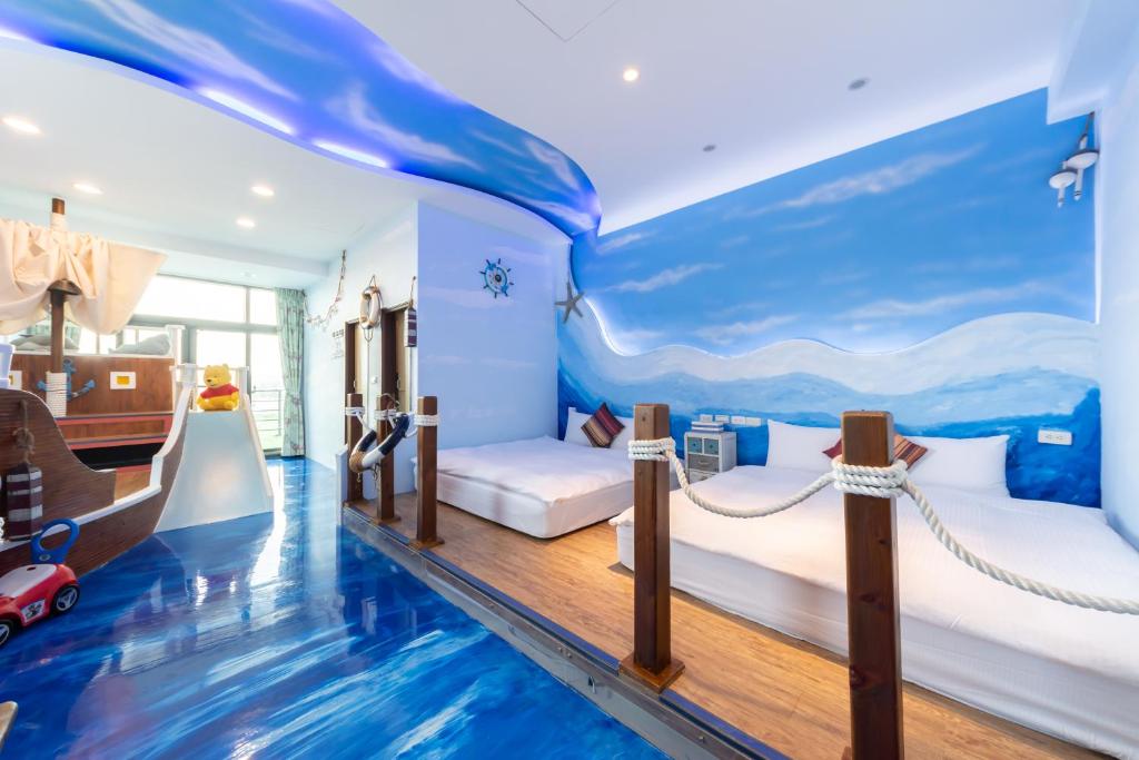 Ένα ή περισσότερα κρεβάτια σε δωμάτιο στο Rococo Homestay