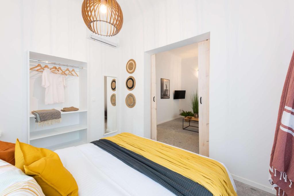 Posteľ alebo postele v izbe v ubytovaní Modita Boutique Apartments