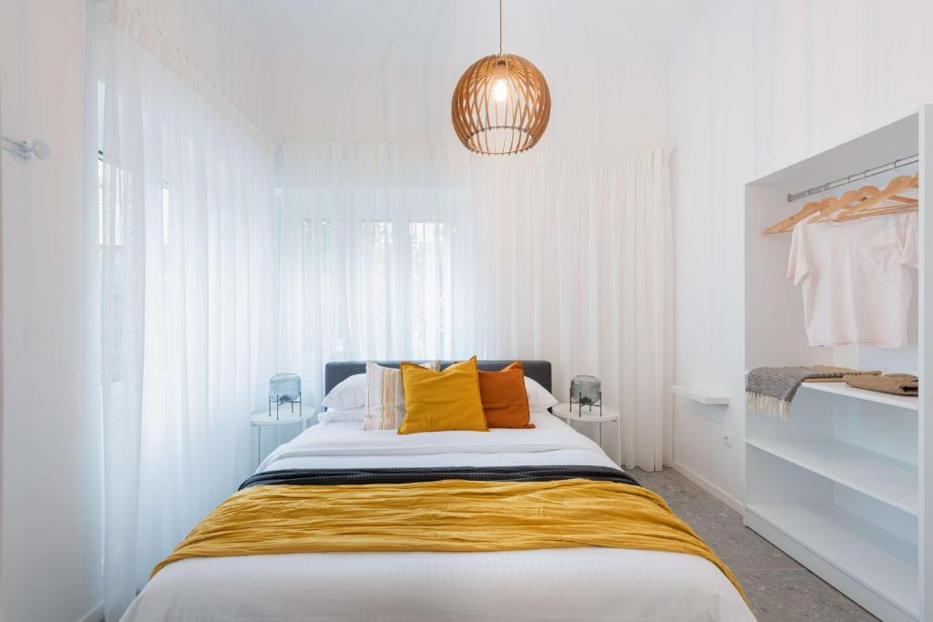 Posteľ alebo postele v izbe v ubytovaní Modita Boutique Apartments