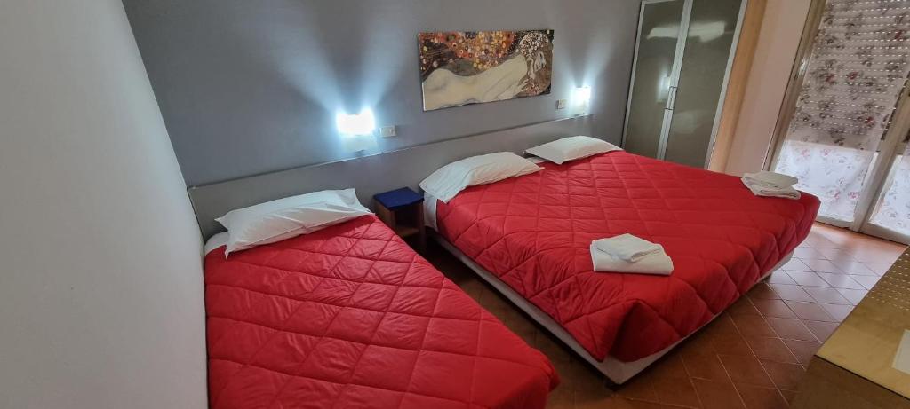 Postel nebo postele na pokoji v ubytování Hotel Indicatore