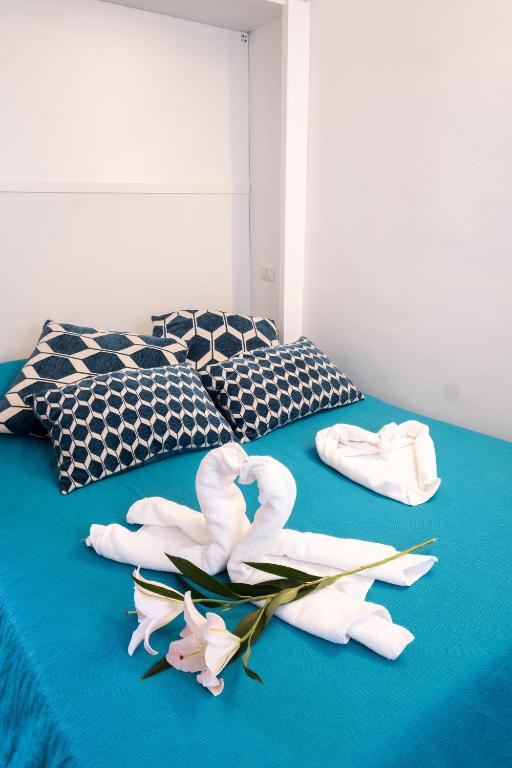 Posteľ alebo postele v izbe v ubytovaní RomAntic Tiny House Aventino