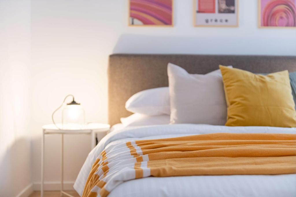 Posteľ alebo postele v izbe v ubytovaní Modita Boutique Apartments