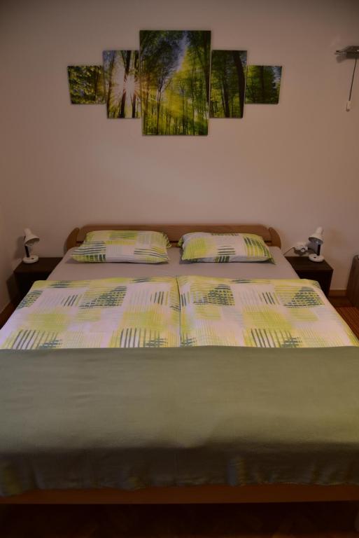Postel nebo postele na pokoji v ubytování Primula Apartment