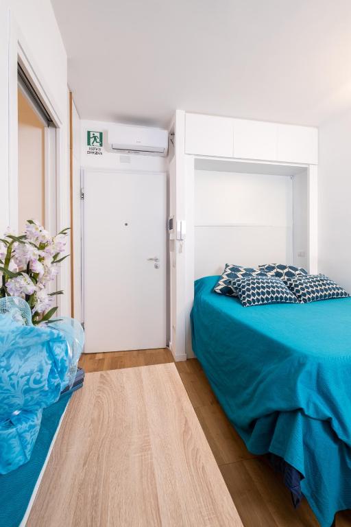 Posteľ alebo postele v izbe v ubytovaní RomAntic Tiny House Aventino
