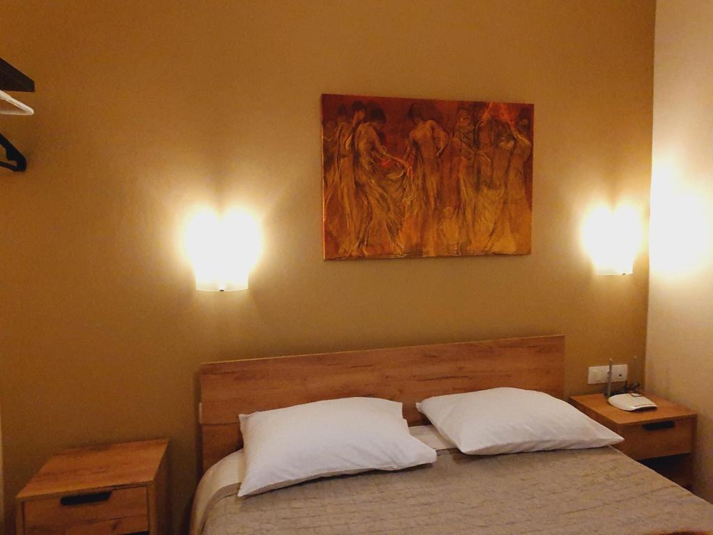 Posteľ alebo postele v izbe v ubytovaní CASA AL MARE 1