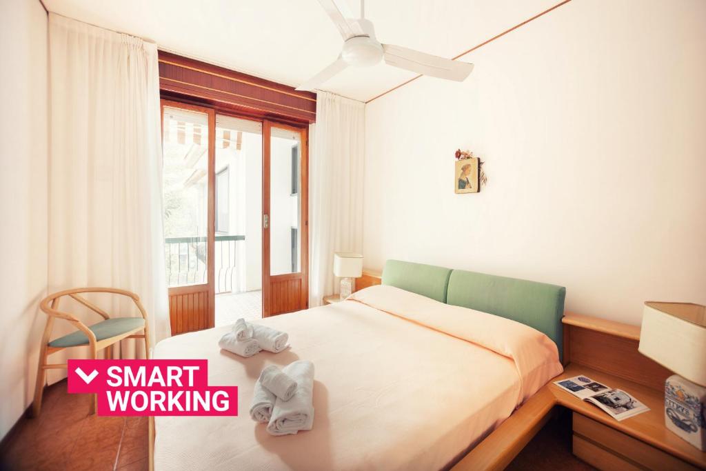 A bed or beds in a room at A due passi dal mare by Wonderful Italy