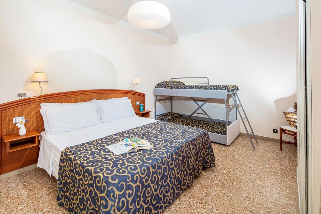 Postel nebo postele na pokoji v ubytování Hotel Horizonte