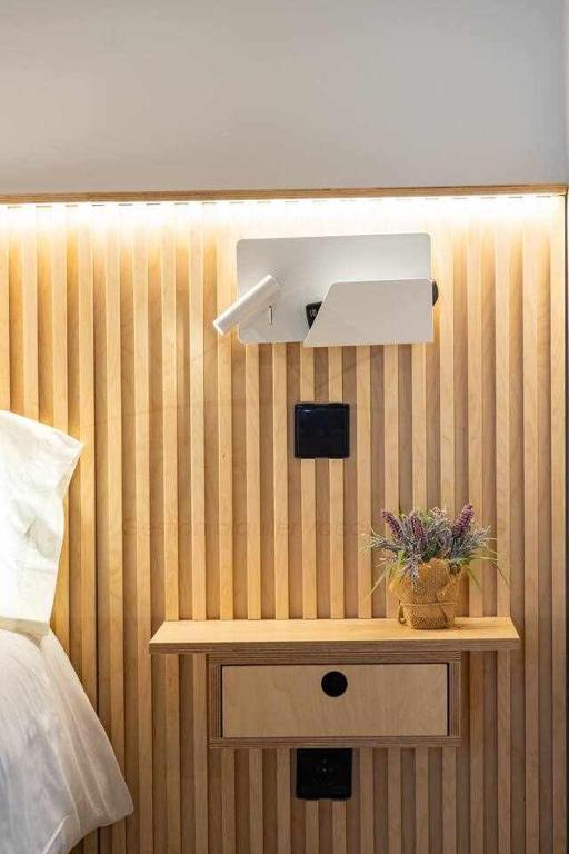 A bed or beds in a room at Palomar de Corrida Atico con terraza By Silastur