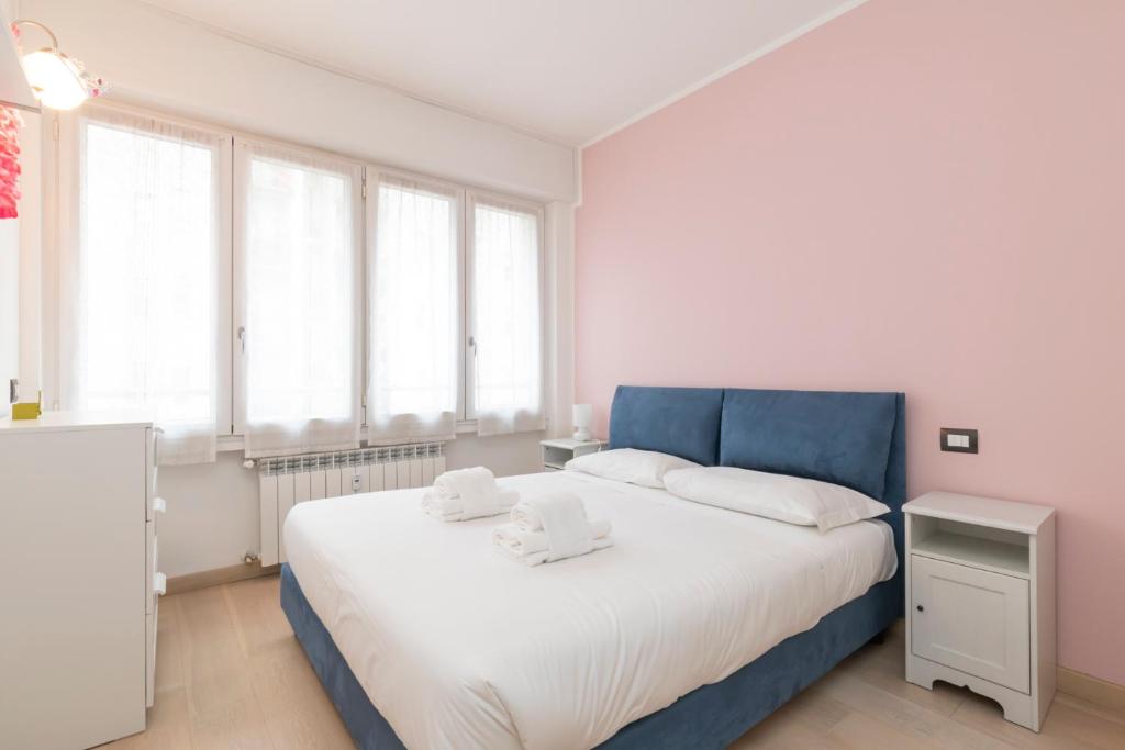 Posteľ alebo postele v izbe v ubytovaní [Luxury apartment near Bocconi] Zamenhof 7